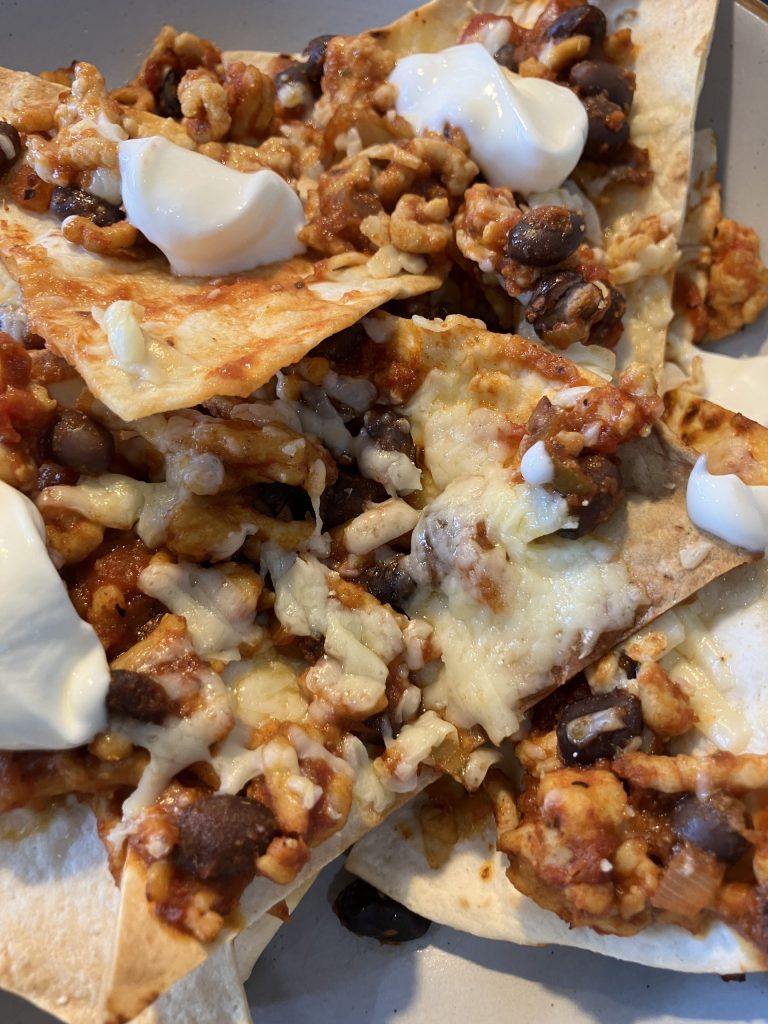 A healthier take on classic nachos using chicken mince and air-fried tortilla chips. Perfect for fake-away night — lower in fat, high in flavour, and simple to make.